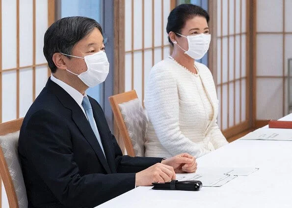 At Akasaka Imperial Residence. Empress Masako is wearing pearl earrings pearl necklace and white tweed jacket and skirt