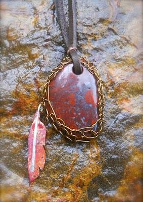 Leather, copper and fine silver feather, netted stone pendant