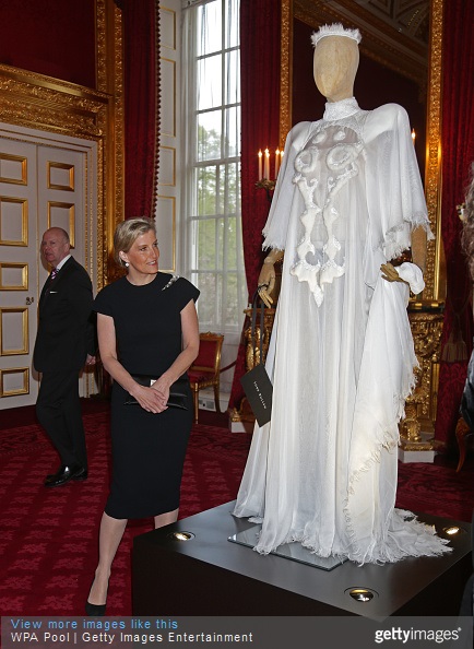 Sophie, Countess of Wessex looks at a dress on display during a reception for the London College of Fashion at St James's Palace on April 28, 2015 in London, England.