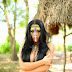 Sue Lasmar poses dressed as India during a visit to tribe
