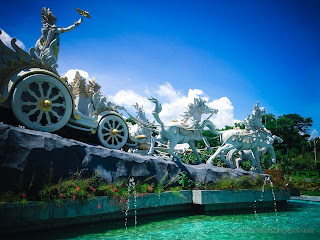 Beautiful Krishna's Chariot Statue In The Middle Of A Garden Pond At Tangguwisia Village, North Bali, Indonesia