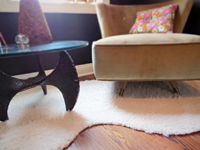 closer view of fluffy fabric DIY rug under chair