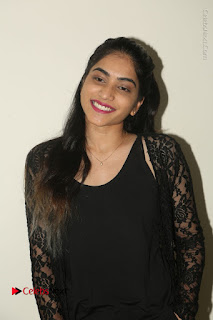 Actress Punarnavi Bhupalam Stills in Black Dress at Pittagoda Press Meet  0001