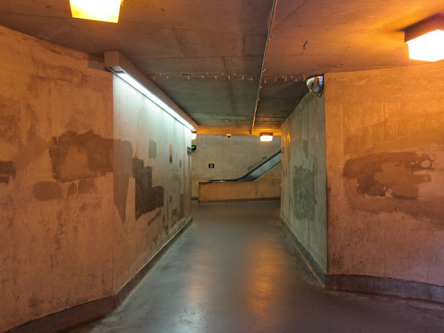 Passenger walkway beneath the platforms at Lawrence East.