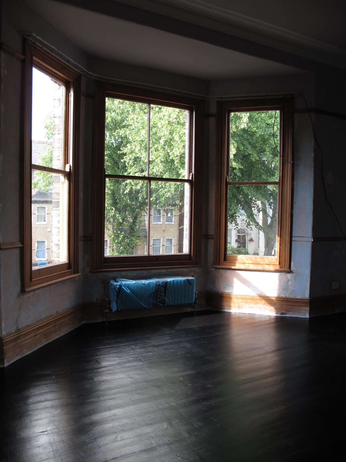 47 Park Avenue Black Painted Floorboards....