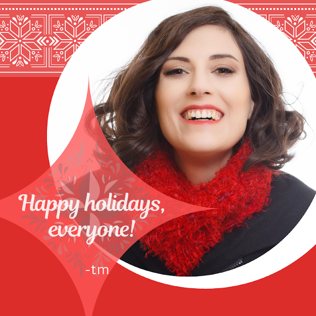 a smiling tm with curled hair and makeup, wearing a black wool coat and red scarf wishes everyone happy holidays!