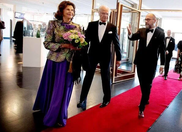  Queen Silvia is wearing sequin blazer and pleated maxi skirt