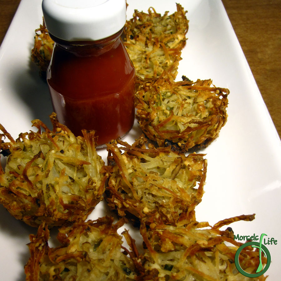 Morsels of Life - Mini Parmesan Hash Brown Cups - Crispy, golden baked potato cups accented with Parmesan cheese, a zing of black pepper, and green onions.