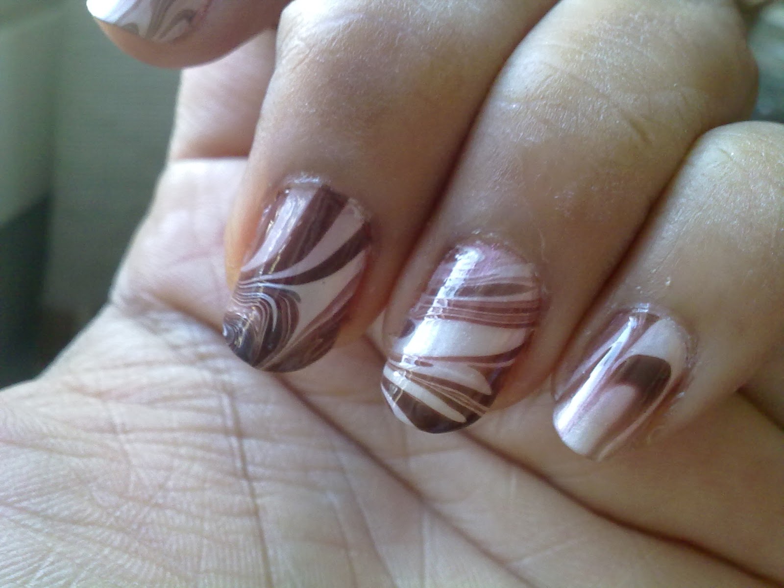 3. Brown and White Marble Nail Design - wide 4