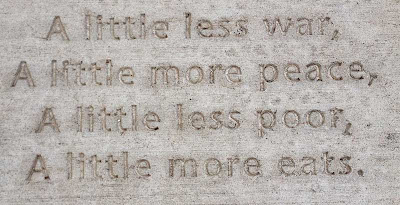 Poem stamped in concrete, reading