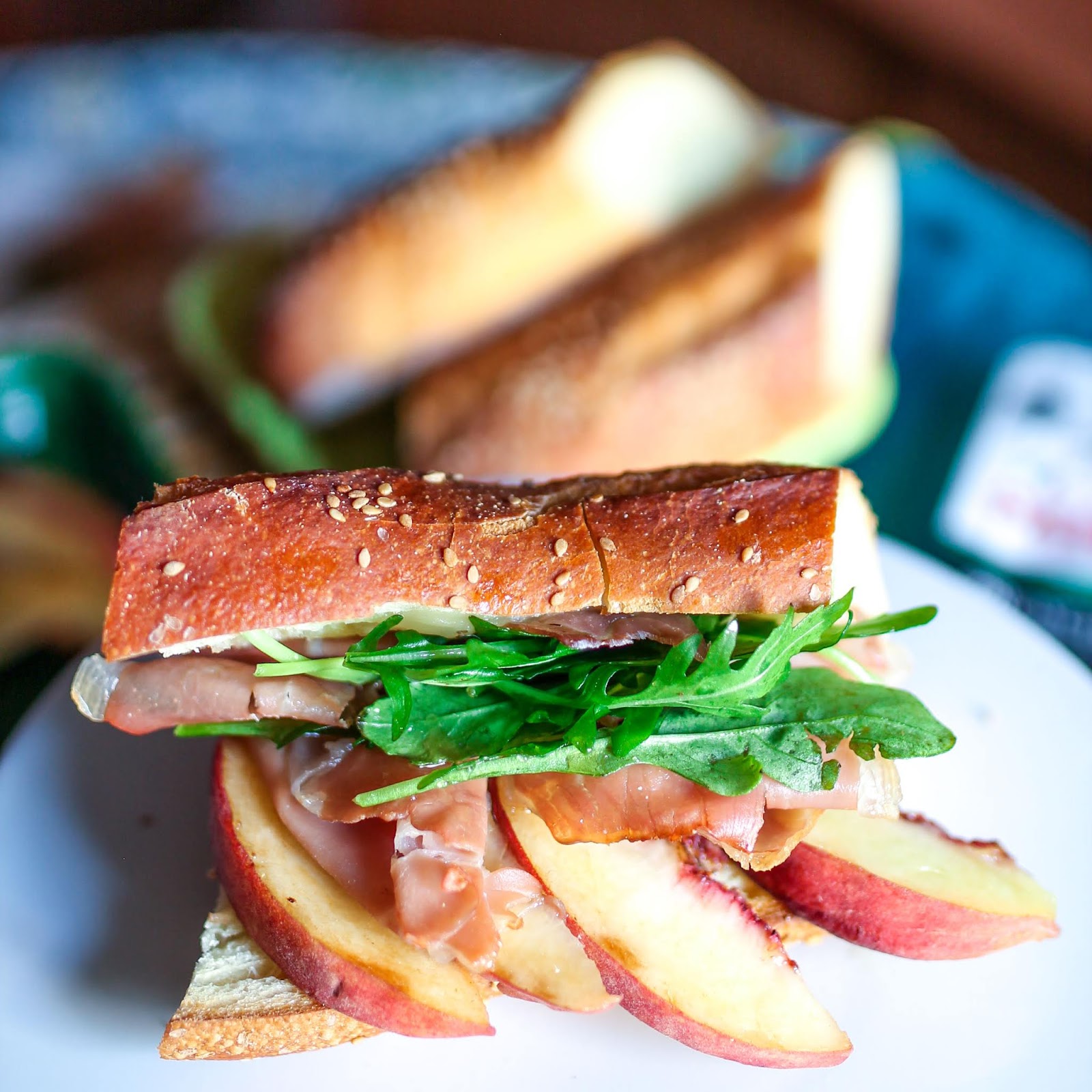 Easy Prosciutto and Brie Baguettes with Fresh Peaches and Honey Drizzle