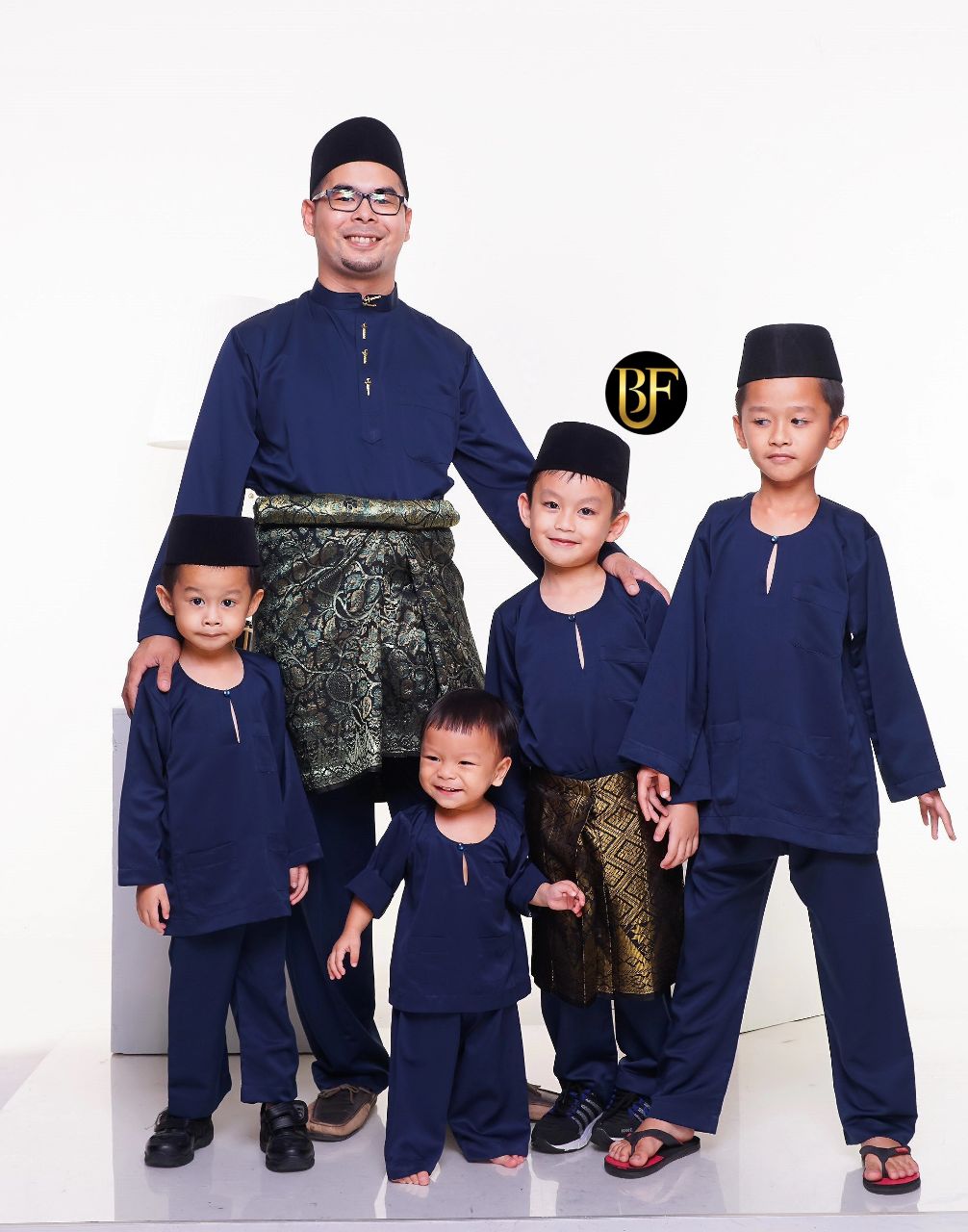 Baju melayu sedondon ayah dan anak