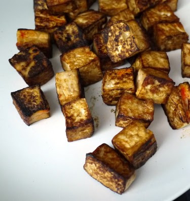 browned tofu cubes with soy sauce and sriracha