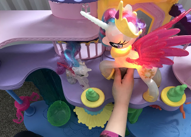 My Little Pony Glitter & Glow Princess Celestia against a normal sized pony