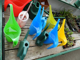 Sunnybrook McLean House greenhouse watering cans by garden muses-not another Toronto gardening blog