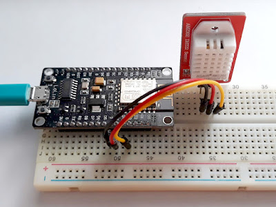 DHT22 wired to ESP8266 NodeMcu on the breadboard