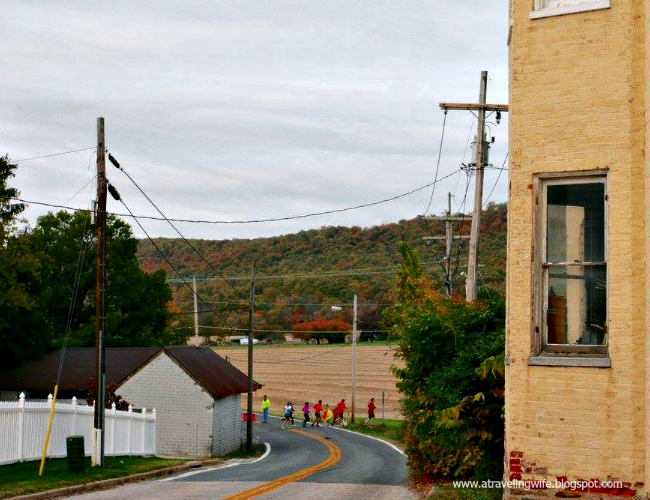 a traveling Wife Running Through A Haunted Town