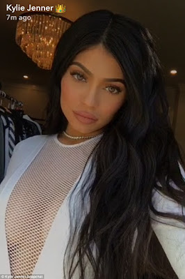 Kylie Jenner shows off massive cleavage in mesh top