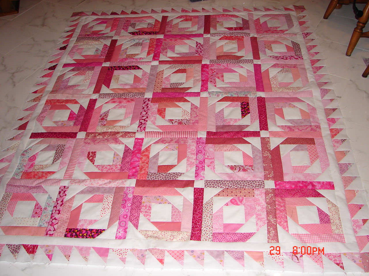 JulieKQuilts Jubilee quilt, and borders in (on) the pink!