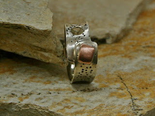 https://www.etsy.com/listing/470127940/silver-ring-with-copper-piece?ref=shop_home_active_6