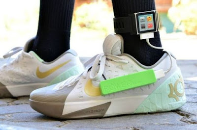 Mobile device charging shoe by Angelo Casimiro