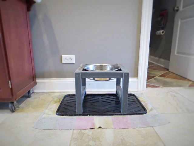 wood water bowl stand in kitchen