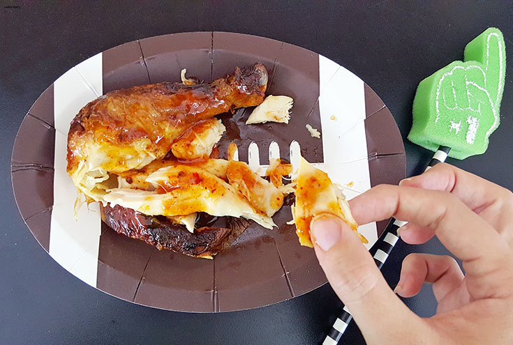 This super saucy Adobo Apricot BBQ Chicken is the best and easiest recipe to serve up on game day! Your hands may get a little messy, but the flavor is worth it!