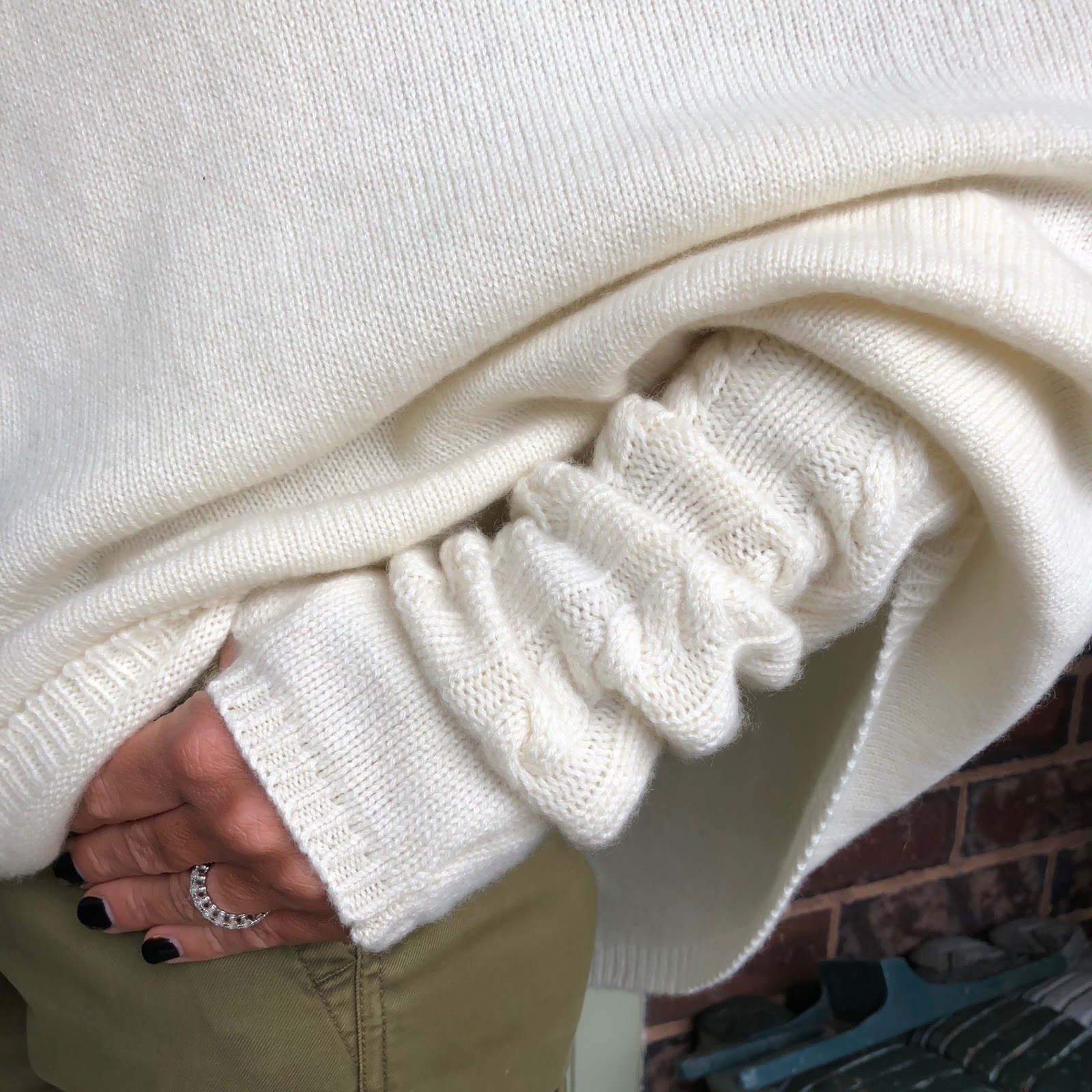 my midlife fashion, italy in cashmere cream white pure cashmere cable knit wrist warmer gloves, italy in cashmere cream white pure cashmere roll neck poncho cape