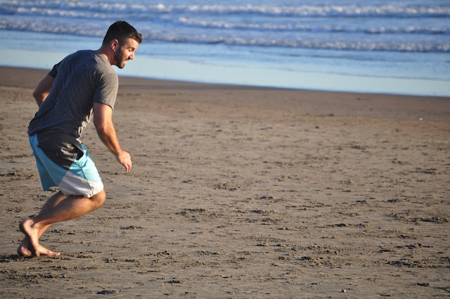 stinson beach california Young man weraring running blue shorts hot 