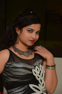 Shrisha Dasari in Sleeveless Short Black Dress At Follow Follow U Audio Launch 003