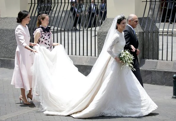 Princess Alessandra's wedding dress from fashion designer Jorge Vázquez. Princess Eugenie wore Alice + Olivia Coco Dress, Princess Alexandra wore Giambattista Valli Dress. Borromeo
