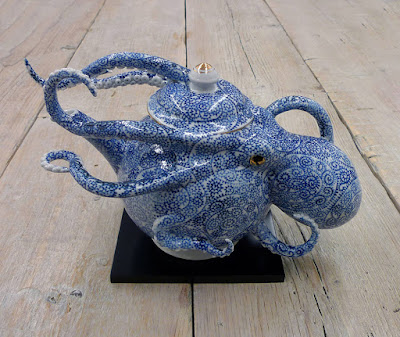 http://www.thisiscolossal.com/2017/06/octopi-embedded-in-ceramic-vessels-by-keiko-masumoto/?src=footer