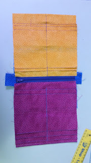 Card pockets folded and sewn, zippered coin section starting to come together Card pockets folded and sewn, zippered coin section starting to come together