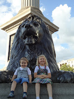 Top Ender and Big Boy in front of a Trafalgar Square Lion