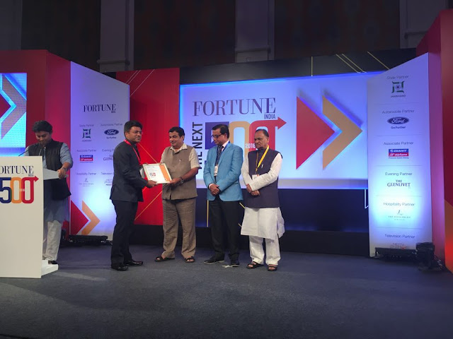 Mr. Deepak Chiripal, CEO, Nandan Denim Ltd receiving award from Shri Nitin Gadkari, Union Minister for Road Transport and Highways and S Mr. Deepak Chiripal, CEO, Nandan Denim Ltd receiving award from Shri Nitin Gadkari, Union Minister for Road Transport and Highways and S