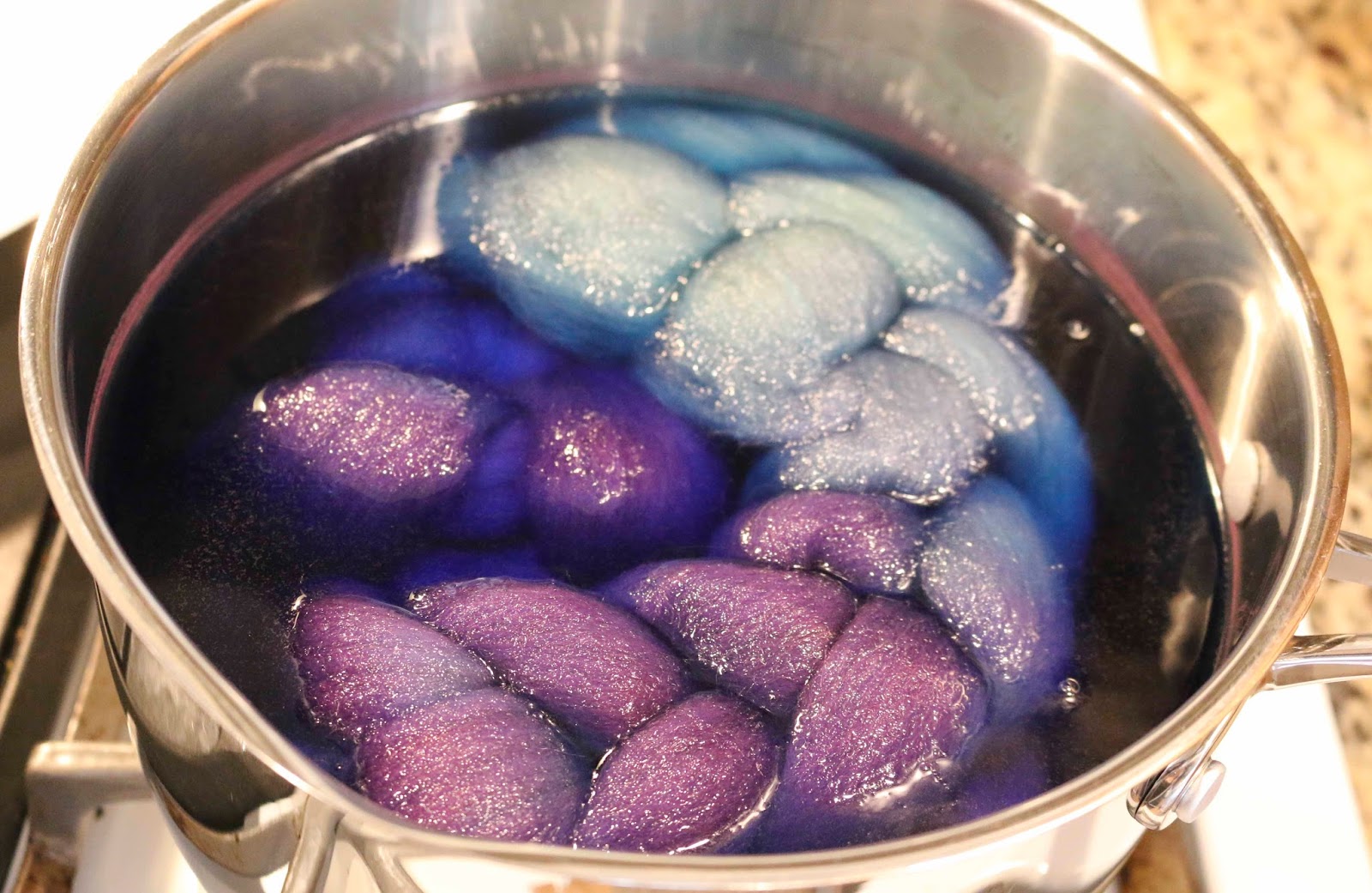 ChemKnits Dip Dyeing Braided Roving into WIlton's Violet Food Coloring