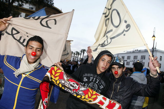 Image Attribute: In Rabat, Morocco, youth celebrate the 2011 uprising in the region, asking for more rights. Reuters