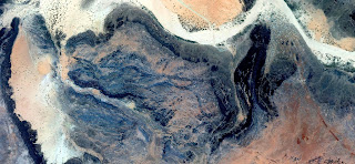 ghost stone head,abstract landscapes of deserts,Abstract Naturalism,abstract photography deserts of Africa from the air,abstract surrealism,mirage in Sahara desert,fantasy forms of stone in the desert abstract photography deserts of Africa from the air,mirage in Sahara desert,