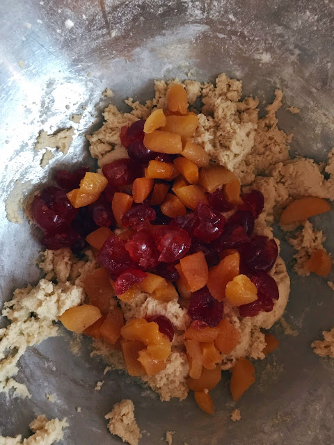 Mixture with the cherries and apricots being added