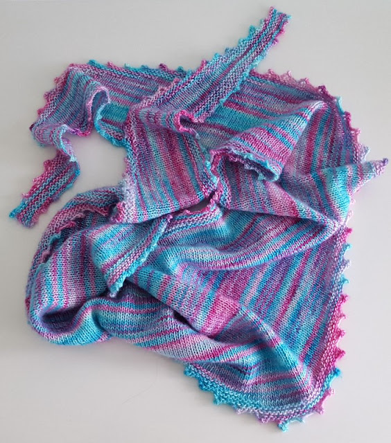 Beautiful hand knitted shawl in hand-dyed yarn.