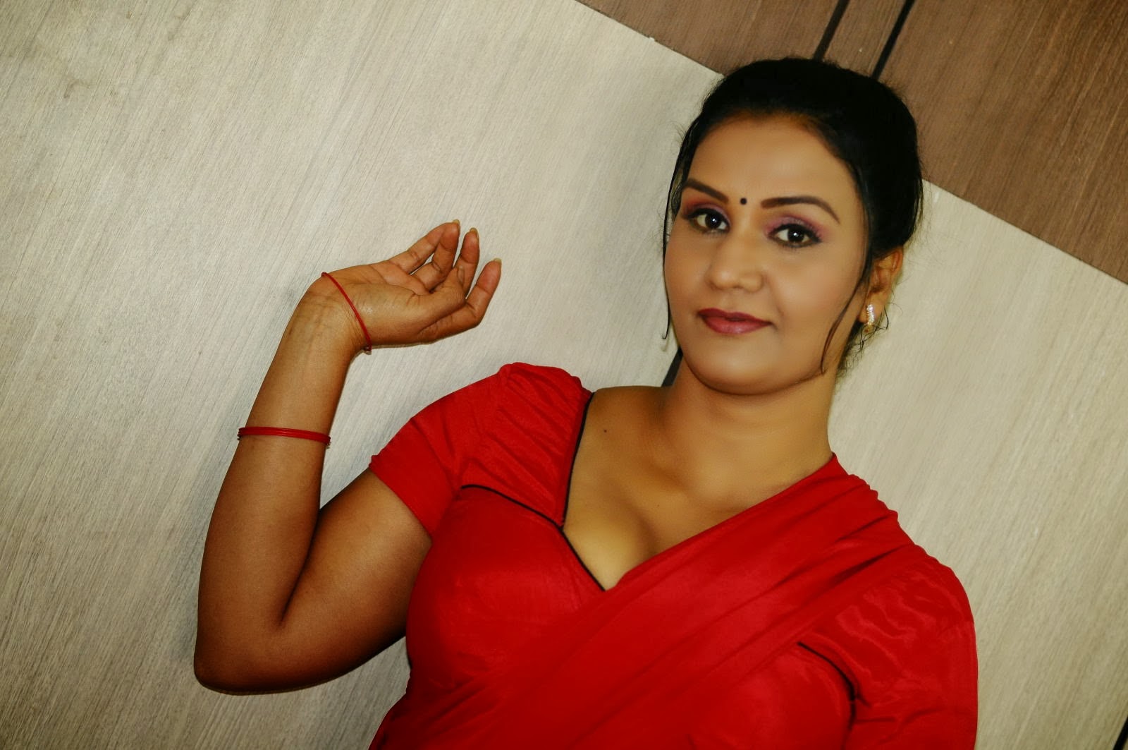 Actress Apoorva Hot Navel Show in Red Saree Photo Gallery
