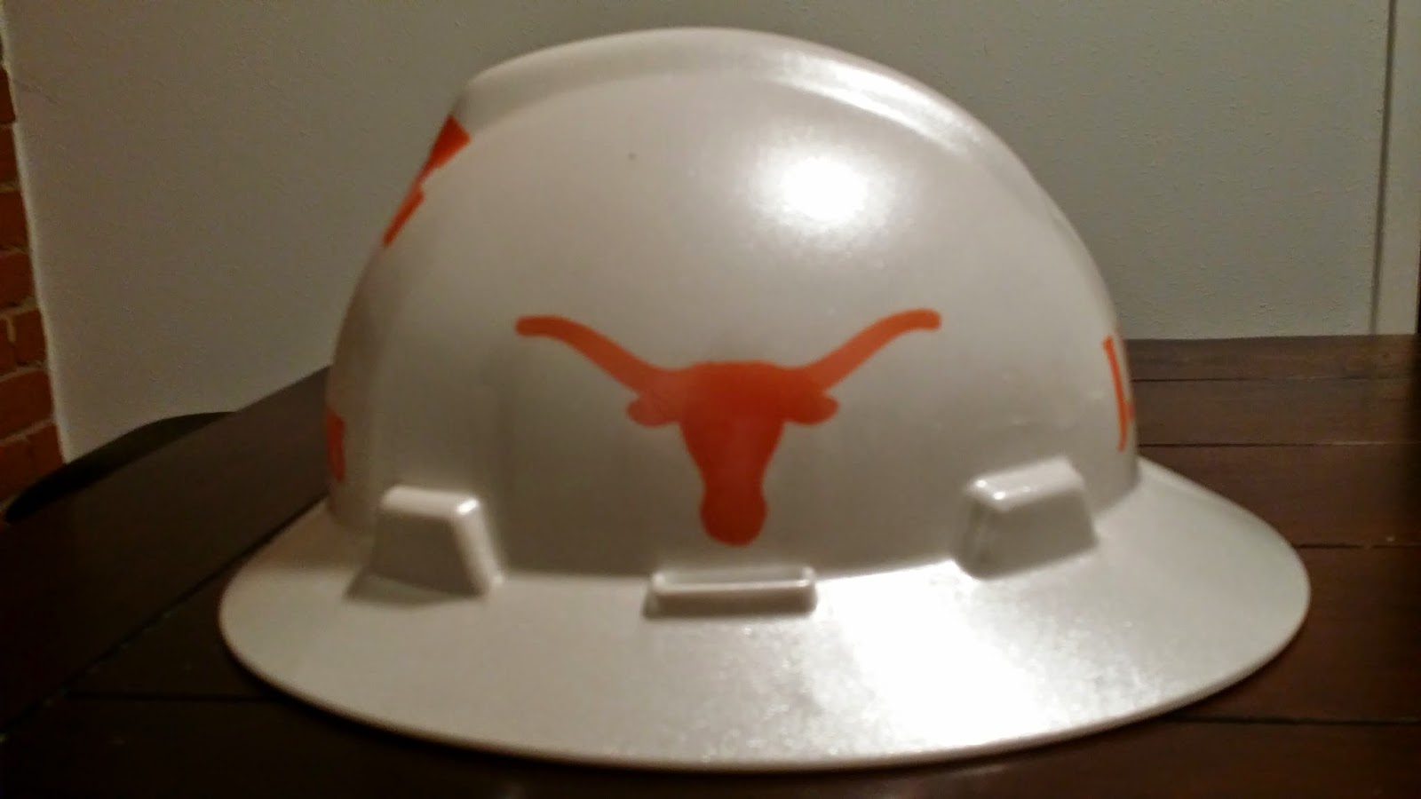 Zimmer DesignZ Custom Paint Halliburton and UT hard hats this weekend.