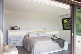 Marzua: Dormitorio con cuarto de baño y vestidor integrados