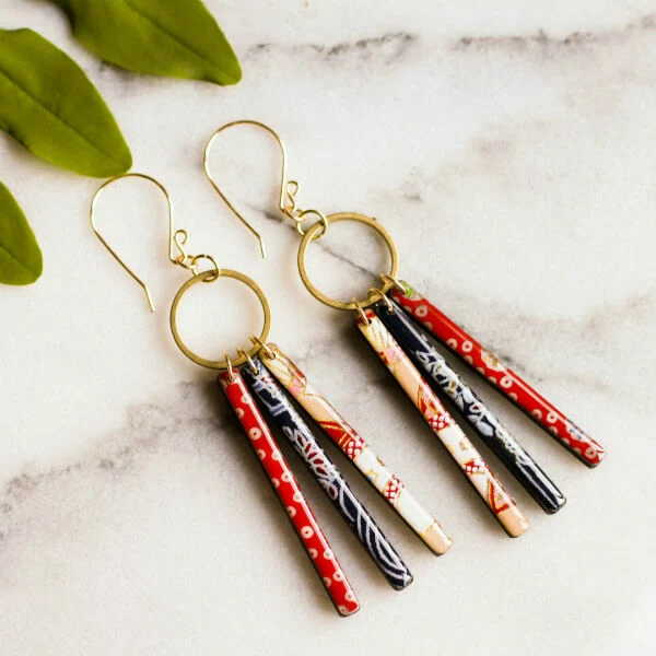 trio of red, white, and blue japanese paper rod and resin drop earrings on brass circles
