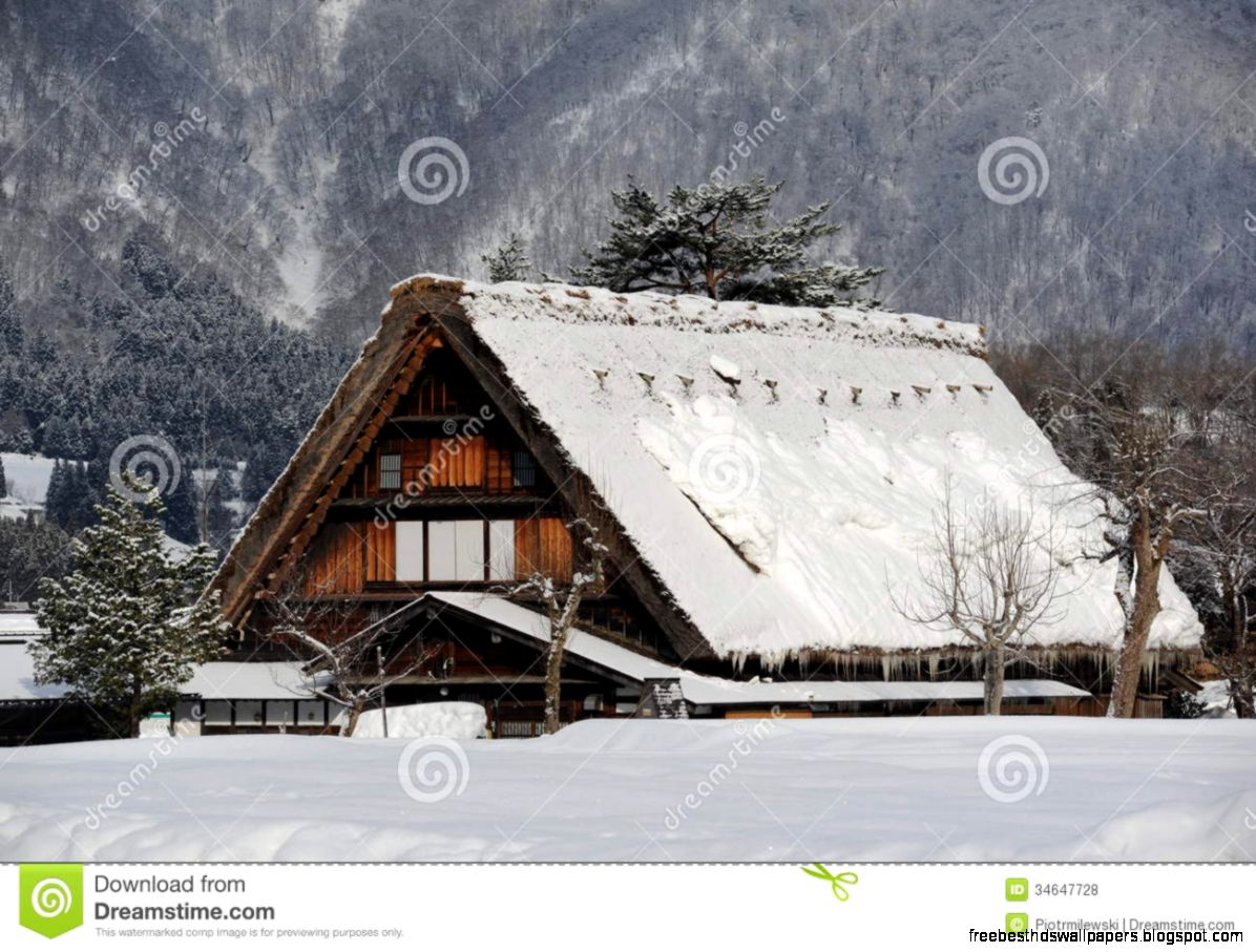 Thatched Roof House Covered In Snow Stock Photos   Image 34871663