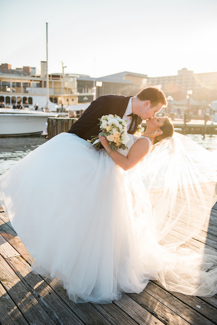 Groom dipping bride in Baltimore Maryland wedding