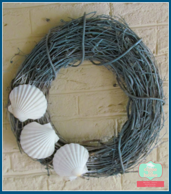 Summer Crafts like our Simple Beach Theme Wreath are a great way to make an affordable version of a favorite store home decor item! This easy summer crafts idea is perfect for any budget!