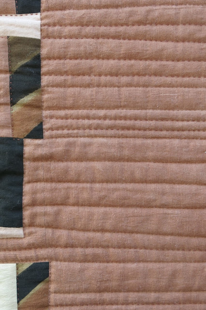 Fabrics from Mali - Hand quilting in progress