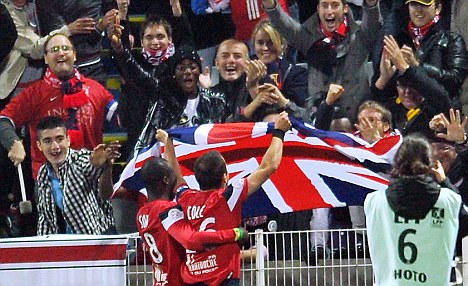 Joe Cole scores his 2nd for Lille, celebrates with a Union Jack