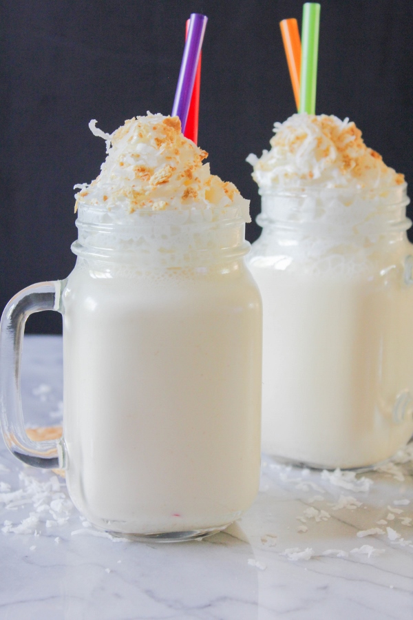 These decadent and delicious Coconut Cream Pie Milkshakes are simple to make and are the perfect treat on a hot summer day!